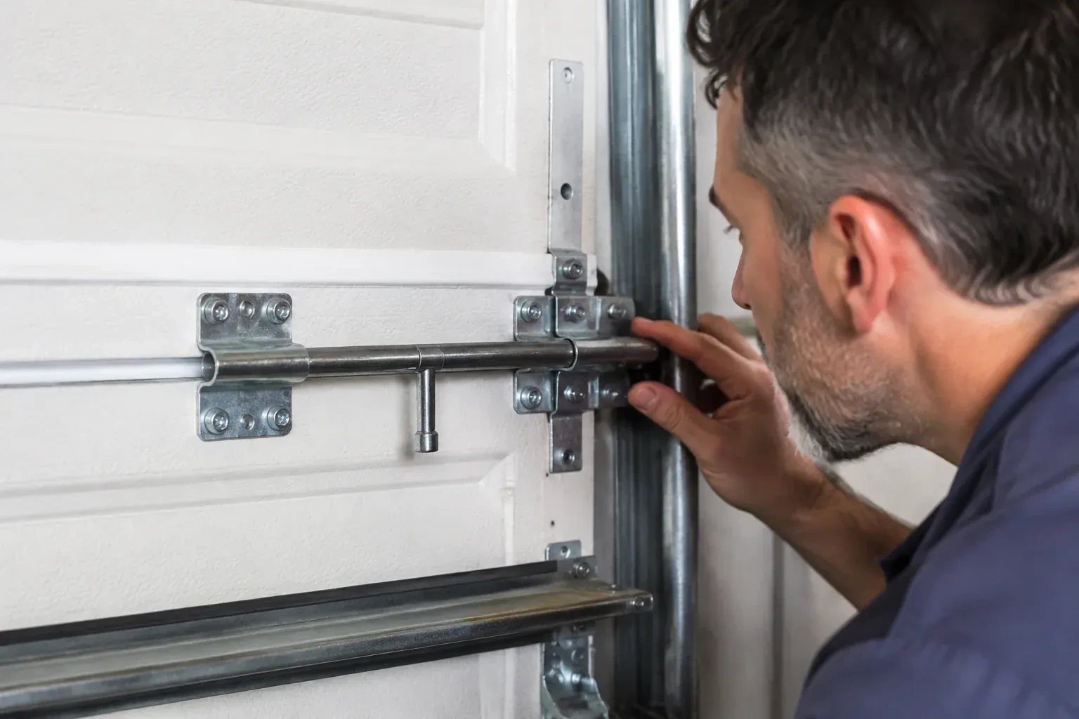 Illustrative garage doors scene; not an actual job — Garage Door Manual Lock Repair, Fort Erie